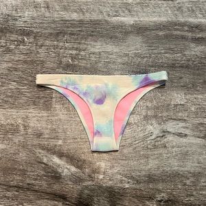 Triangl tie dye cheeky swim bottoms.